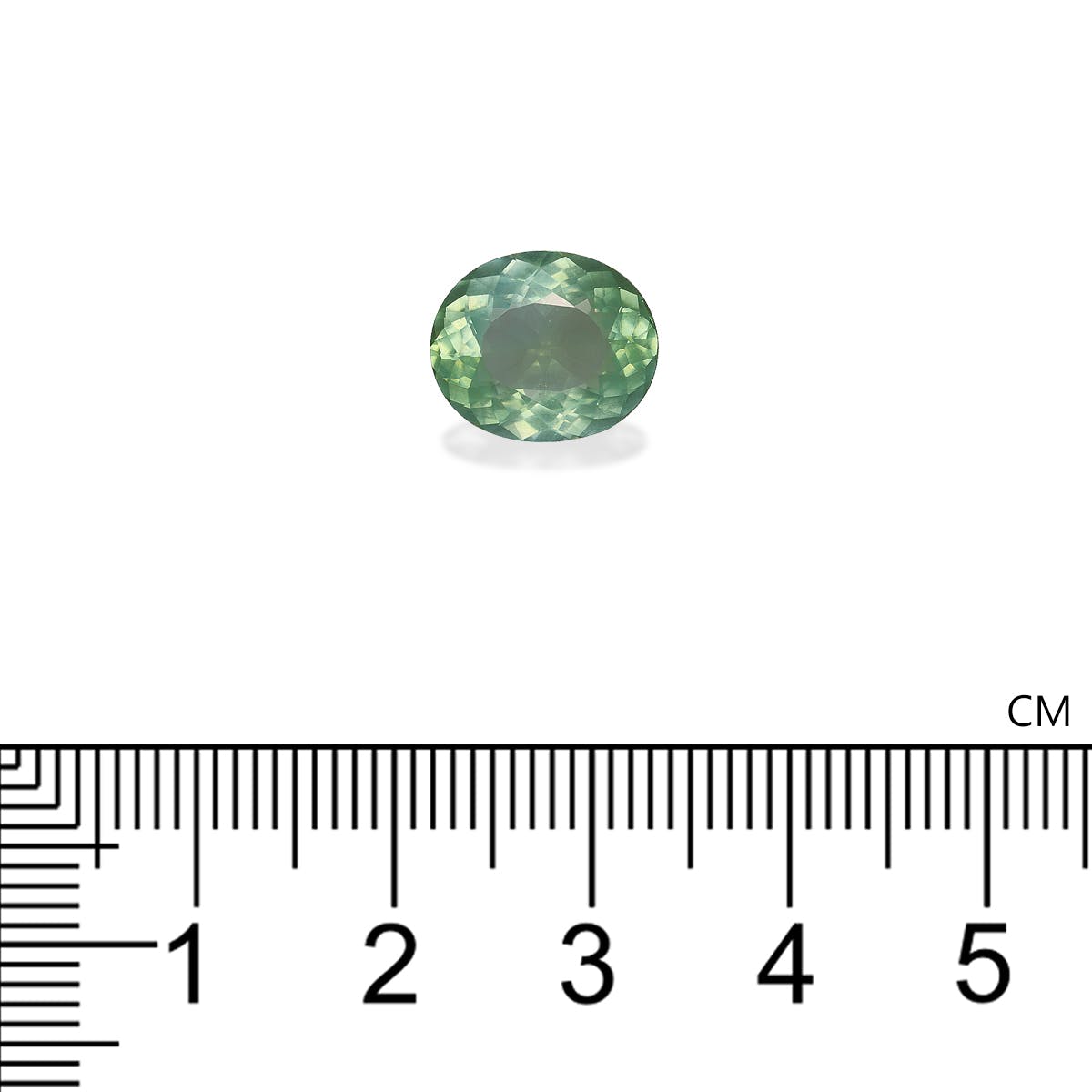 Une petite pierre précieuse verte de forme ovale de Bonnot Paris, la Tourmaline Paraïba · 3,87 ct, est posée sur une surface blanche au-dessus d'une règle centimétrique, présentant des dimensions légèrement inférieures à 1,5 cm de longueur.