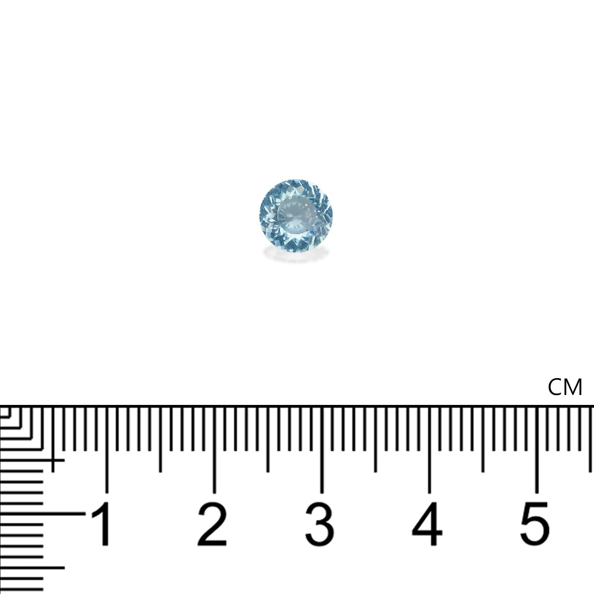 Une petite pierre précieuse ronde de Tourmaline Paraïba bleue de Bonnot Paris repose sur un fond blanc avec une règle en dessous indiquant qu'elle mesure environ 6 millimètres de diamètre.
