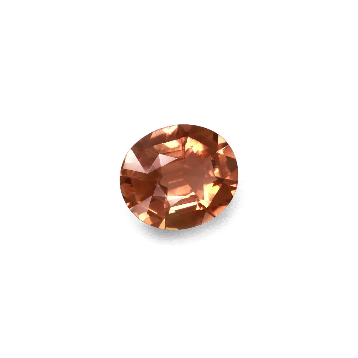 Une pierre précieuse brune facettée de 6,68 carats, de forme ovale, présentée sur un fond blanc uni. Les reflets et les reflets rehaussent sa clarté et sa couleur. Marque : Bonnot Paris ; Produit : Tourmaline jaune.