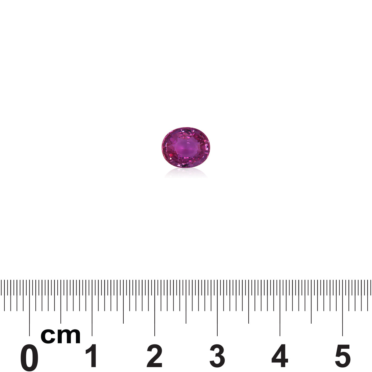 Le Saphir Violet · 1,58 ct de Bonnot Paris, une petite pierre précieuse rose de forme ovale, est présenté au-dessus d'une règle marquée en centimètres et en millimètres pour l'échelle, révélant son diamètre comme inférieur à 1 cm.