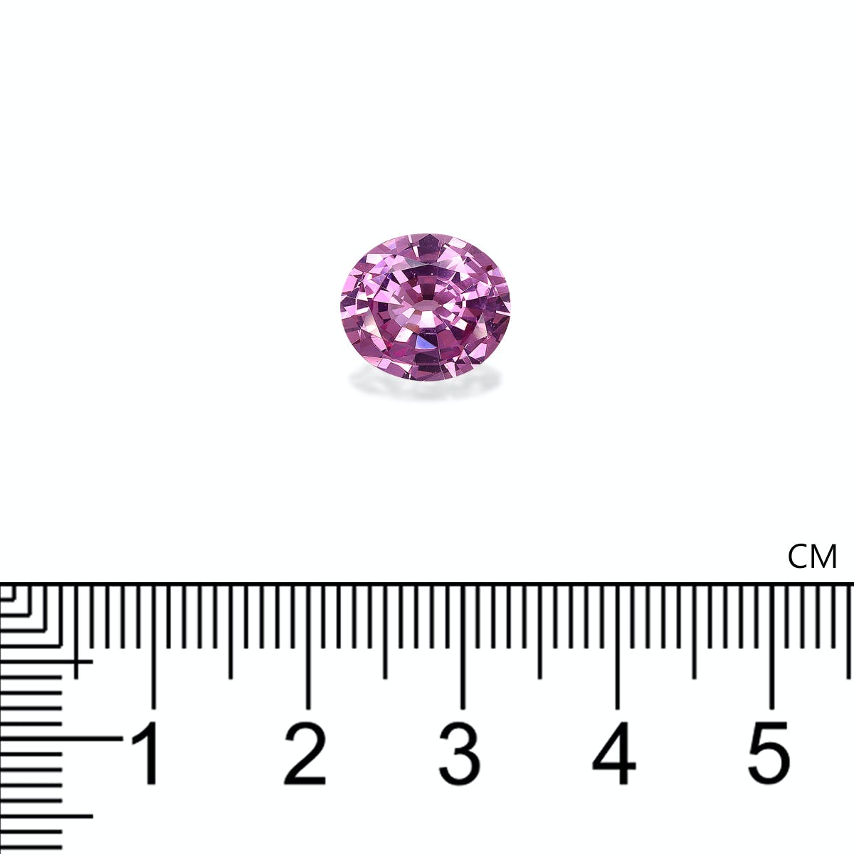 Une pierre précieuse ronde en spinelle rose de Bonnot Paris, pesant 3,93 ct, est positionnée sur un fond blanc à côté d'une règle graduée en centimètres, révélant qu'elle mesure environ 1,1 cm de diamètre.