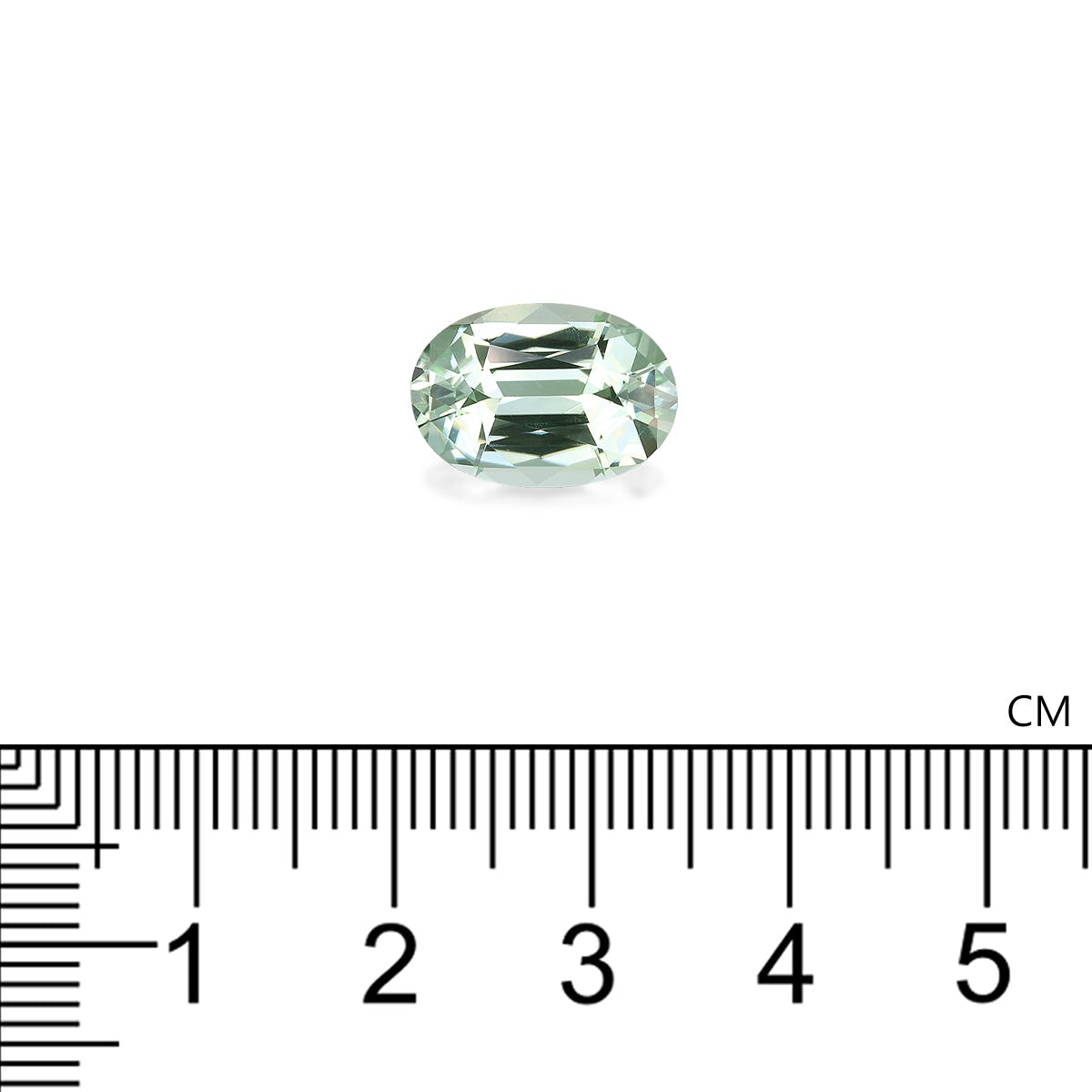 La Tourmaline Verte · 5,01ct de Bonnot Paris, une pierre précieuse vert pâle de taille ovale, repose sur une surface blanche au-dessus d'une règle centimétrique transparente, située entre les repères de 2 cm et 3 cm.