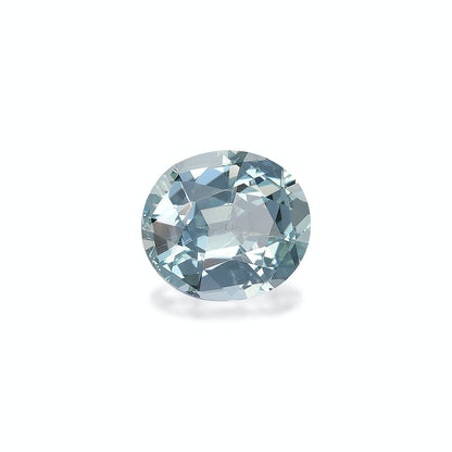 Une Aigue-Marine de 5,32 carats signée Bonnot Paris, taille brillant et d'un bleu transparent, est présentée sur un fond blanc uni. Ses facettes reflètent la lumière pour créer un effet scintillant, laissant apparaître une douce ombre.