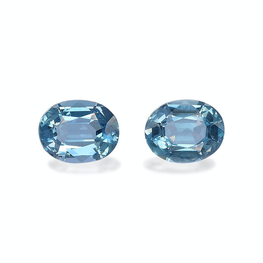 Deux pierres précieuses Aigue-Marine magnifiquement facettées de Bonnot Paris, totalisant 1,64 ct, sont présentées sur un fond blanc uni, mettant en valeur leur teinte bleue vibrante et leurs détails exquis.
