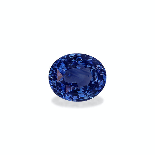 Le Saphir Bleu · 2,54 ct de Bonnot Paris est une pierre précieuse saphir bleu taille ronde brillante sertie sur un fond blanc uni, présentant des teintes bleu profond avec des reflets lumineux et mettant en valeur sa clarté et ses facettes complexes.