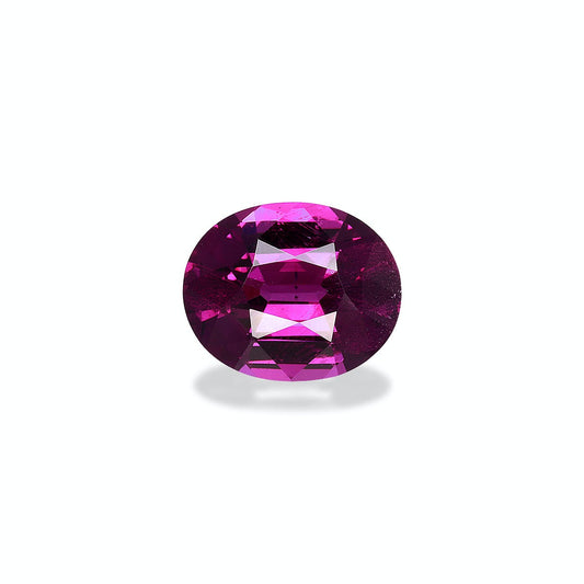 Une pierre précieuse Grenat Umbalite de 4,41 ct de Bonnot Paris, facettée dans une forme ovale avec une riche couleur rose-violet, repose sur un fond gris clair projetant une ombre subtile.