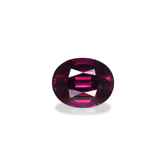 Une pierre précieuse Grenat Umbalite ronde, taillée en facettes, de couleur violet foncé et pesant 4,82 ct de Bonnot Paris, reflète la lumière et projette une petite ombre sur un fond blanc.