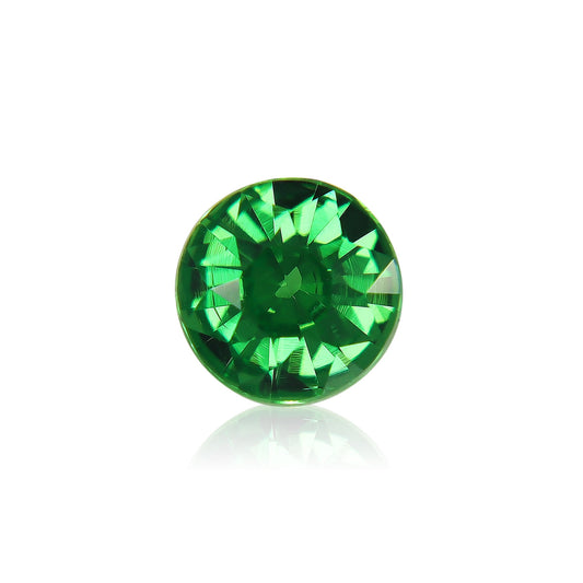 La Grenat Tsavorite Bonnot Paris, 1,49 ct, est une pierre précieuse verte ronde vibrante avec des facettes complexes reflétant la lumière sur un fond blanc.