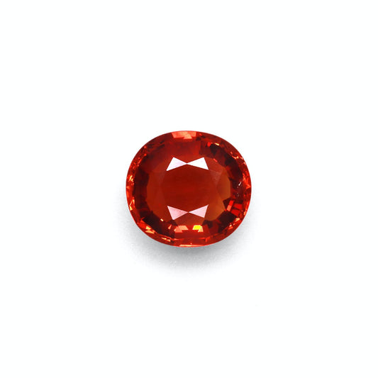 Le Grenat Spessartite · 5,91ct de Bonnot Paris, une pierre précieuse ronde facettée à la teinte orange ardente, est centrée sur un fond blanc uni, affichant sa brillance et sa clarté.