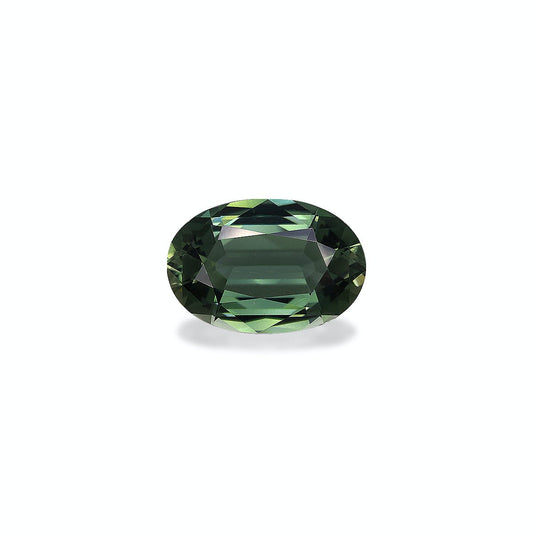 Pierre précieuse d'un vert éclatant, la Tourmaline Verte (6,94 carats) de Bonnot Paris se détache sur un fond blanc uni. Sa forme ovale facettée reflète magnifiquement la lumière, soulignant sa clarté et la précision de ses tailles.