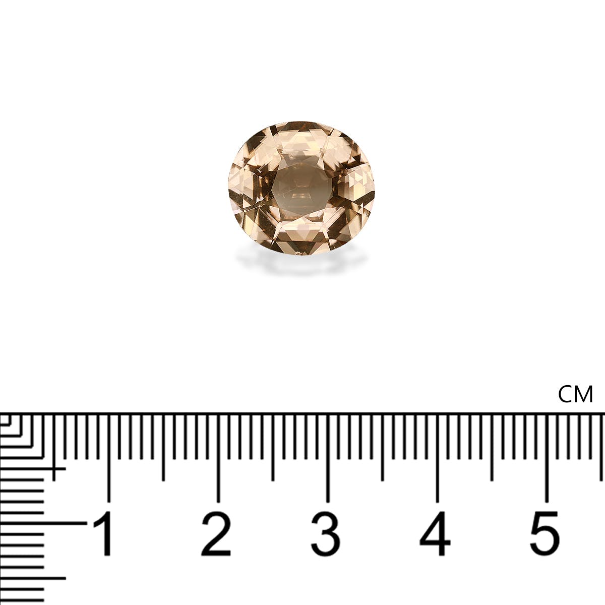Une pierre de Tourmaline Jaune ronde et facettée de Bonnot Paris est positionnée au-dessus d'une règle centimétrique pour l'échelle, mettant en valeur son diamètre d'environ 1 cm et son poids de 5,98 carats.