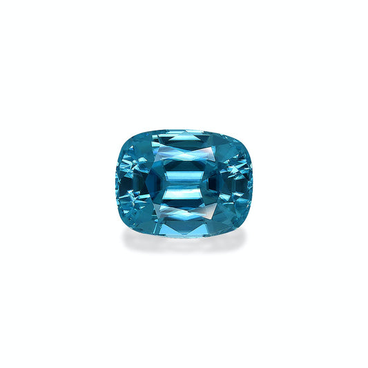 Le Zircon Bleu, une pierre précieuse bleue taille coussin rectangulaire vibrante de 5,29 ct de Bonnot Paris, présente de multiples facettes reflétant la lumière avec une teinte profonde et riche sur un fond blanc uni.